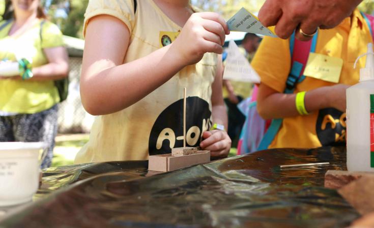 A child creating craft at KCO in 2015